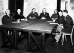 Bradley, Ramsay, Tedder, Eisenhower, Montgomery, Leigh-Mallory, and Smith at a SHAEF conference in London, England, United Kingdom, 1 Feb 1944, photo 1 of 7