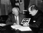 US President Dwight Eisenhower and US National Aeronautics and Space Administration chief Keith Glennan studying photographs taken by satellite TIROS-1, White House, Washington DC, United States, Apr 1960