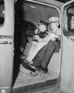 William Leahy, Dwight Eisenhower, and Harold Stark in a car, Antwerp, Belgium, 16 Jul 1945
