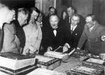 Top German officials visiting the Bavarian State Library, 7 Jan 1936; L to R: Karl Fiehler, Franz von Papen, Adolf Hitler, Ludwig Siebert, Georg Leidinger, Rudolf Buttmann, Franz von Epp