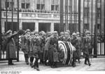 Coffin of Ernst Udet being carried after the funeral service, Berlin, Germany, 21 Nov 1941; note Adolf Galland serving as a honor guard