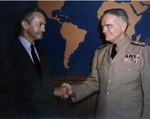 Secretary of the US Navy James Forrestal shaking hands with Admiral William Halsey, probably at the Navy Department, Washington DC, United States, 10 Jul 1945.