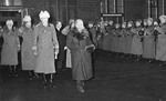 Former President Kyösti Kallio of Finland (resigned) and Field Marshal C.G.E. Mannerheim at Helsinki railway station, Finland, 19 Dec 1940; Pres Ryti, Lt Gen Heindrichs, and Col Paasonen in background