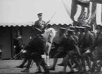 Emperor Showa reviewing troops on his horse Shirayuki, Japan, circa late 1930s