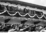 Chancellor Hitler saluting the athletes from balcony of the Olympic House during opening ceremony of the IV Olympic Winter Games, Garmisch-Partenkirchen, Bavaria, Germany, 6 Feb 1936, photo 4 of 4