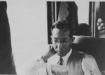 Jiro Horikoshi reading aboard a train, Oct 1938