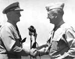 Smith was congratulated by Nimitz after being decorated with a Gold Star in lieu of a second Distinguished Service Medal, date and location unknown