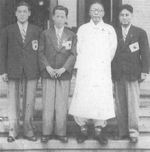 Kim Gu with Korean Boston Marathon participants, 1947; note Suh Yunbok, winner of the marathon, next to Kim