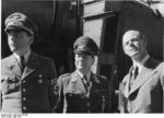 German Minister of Armaments Albert Speer, Field Marshal Erhard Milch, and aircraft designer Willy Messerschmitt inspecting a defense plant, Germany, May 1944