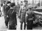 Walter Model speaking with a Hitler Youth soldier, Germany, Oct 1944