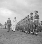 Louis Mountbatten inspecting men of British Royal Air Force Regiment outside the Municipal Building, Singapore prior to the surrender ceremony, 12 Sep 1945