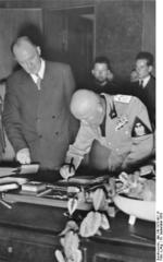 Benito Mussolini signing the Munich Agreement, Germany, 30 Sep 1938, photo 2 of 2