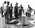 Admiral Chester Nimitz at the US Marine Corps cemetary on Namur Island, Kwajalein Atoll, 6 Feb 1944; also present were USMC Colonel Franklin Hart and Major General Harry Schmidt (with dark glasses)