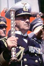 German Navy Grand Admiral Raeder holding his baton at a rally, date unknown