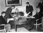 German Foreign Minister Joachim von Ribbentrop signing non-aggression treaties with his Latvian and Estonian counterparts Vilhelms Munters and Karl Selter, Berlin, Germany, 7 Jun 1939