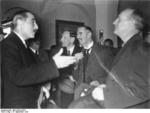 British Ambassador to Berlin Nevile Henderson speaking to German Foreign Minister Joachim von Ribbentrop at the Grand Hotel at Berchtesgaden, Germany, 15 Sep 1938; note British Prime Minister Neville Chamberlain in background