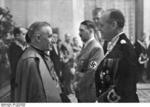 Vatican Apostolic Nuncio to Germany Cesare Orsenigo speaking with Joachim von Ribbentrop, Berlin, Germany, 12 Jan 1939; note Adolf Hitler in background
