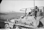 Erwin Rommel observing the field from his SdKfz. 250/3 command vehicle 
