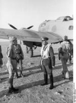 German fighter pilot Joachim Müncheberg and General Erwin Rommel in front of a He 111 aircraft, North Africa, 1941-1942