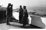 Erwin Rommel and Fritz Bayerlein in conversation near the harbor at Tobruk, Libya, circa Jun 1942