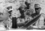 Erwin Rommel, Fritz Bayerlein, and other German and Italian officers in North Africa, summer 1942