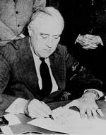 Franklin Roosevelt signing the Declaration of War against Japan, 8 Dec 1941