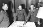 Erwin Rommel and Gerd von Rundstedt in discussion at the Hotel George V, Paris, France, 19 Dec 1943, photo 5 of 5; General Alfred Gause at right of photo