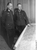 Rundstedt and Rommel studying a map at the LXXXI Army Corps headquarters in Northern France, 30 Mar 1944