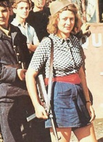 Simone Segouin with MP 40 submachine gun, Paris area, France, late Aug 1944