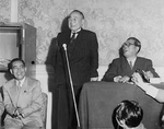 Construction Minister Eisaku Sato, Prime Minister Shigeru Yoshida, and Party Chairman Saeki Ozawa at a Liberal Party meeting in Japan, 1953