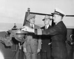US President Harry Truman, Secretary of State James Byrnes, and Captain James Foskett aboard USS Augusta, 11 Jul 1945
