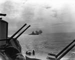 USS Alabama firing in exercise somewhere in the South Pacific, 29 Oct 1943; note secondary guns of USS South Dakota in foreground