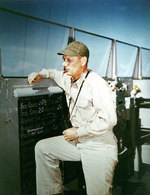 Captain Kenneth H. Noble aboard Alaska, Feb 1945