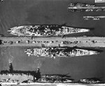 Battleship Missouri, large cruiser Alaska, escort carrier Croatan, and destroyers at Norfolk Operating Base, Norfolk, Virginia, 20 Aug 1944