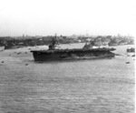 USS Anzio at anchor in the Huangpu River, Shanghai, China, 1 Dec 1945