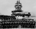 Crew of USS Augusta, Shanghai, China, 6 Apr 1935; note Chester Nimitz front row just left of the life preserver and Lewis Puller in front row, third from right