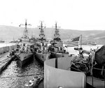 Biscayne, Doran, and another ship docked at Arzew, Algeria, 11 Jun 1944
