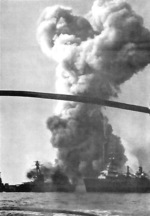 Smoking rising from battleship Bretagne, Mers-el-Kébir, Algeria, 3 Jul 1940