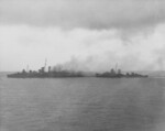 USS Blue and USS Patternson removing the crew from the fatally damaged Canberra 9 Aug 1942