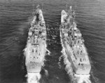 USS Boston and USS Canberra practicing high-line operations for the transfer of WW2 Unknown Soldier, 22 Apr 1958