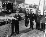 Lieutenant Eugene Dente speaking at the USS Capitaine recommissioning ceremony, Mare Island Navy Yard, Vallejo, California, United States, 23 Feb 1957