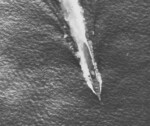 Chikuma during Battle of the Santa Cruz Islands, 26 Oct 1942; photograph taken by an aircraft from USS Enterprise; note smoke coming from bridge area which sustained bomb damage