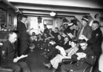 US Navy Chief Petty Officers aboard battleship Colorado studying 
