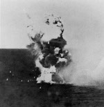Ki-51 special attack aircraft of Japanese Army Sekicho Squadron striking USS Columbia in Lingayen Gulf, Philippine Islands, at 1729 hours on 6 Jan 1945; photograph taken from USS California