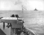 USS Columbia and other warships off Bougainville, Solomon Islands, 1-2 Nov 1943; note crashed Japanese aircraft ahead of USS Columbia