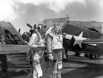 Two US Navy fighter pilots aboard carrier Enterprise during the raid on Truk Atoll in the Caroline Islands, 16 Feb 1944
