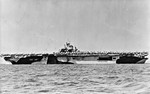 USS Essex departing San Francisco Naval Shipyard, California, United States, 15 Apr 1944, photo 1 of 4; note camouflage measure 32 design 6/10D
