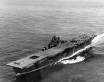Franklin approaching New York City, New York, United States, 26 Apr 1945; note damage on her flight deck