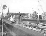Port quarter view looking forward showing submarines Gar and Grampus fitting out, Groton, Connecticut, United States, 3 Jan 1941