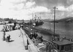 Two submarines of US Navy Submarine Squadron 50 at Rosneath, Scotland, United Kingdom, circa 7 Dec 1942; sub possibilities were USS Barb, USS Blackfish, USS Herring, USS Shad, USS Gunnel, and USS Gurnard